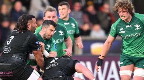Tiernan O'Halloran is tackled by Lucio Sordoni and Fraser Brown