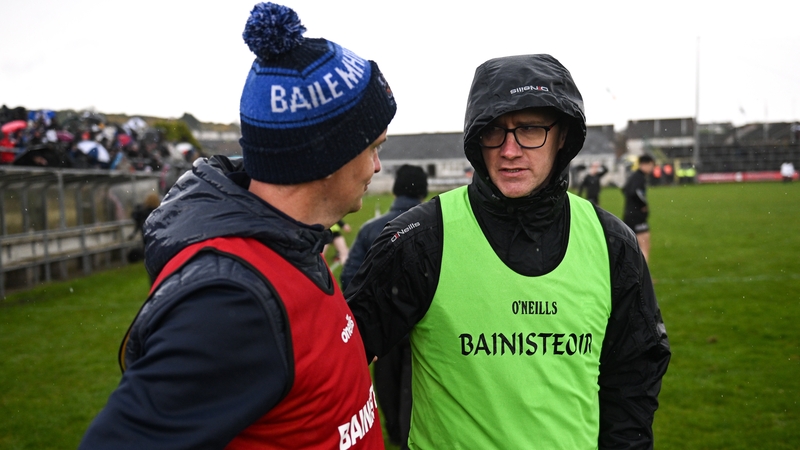 Johnny McGeeney and Tony McEntee chat after the game at a sodden Markievicz Park