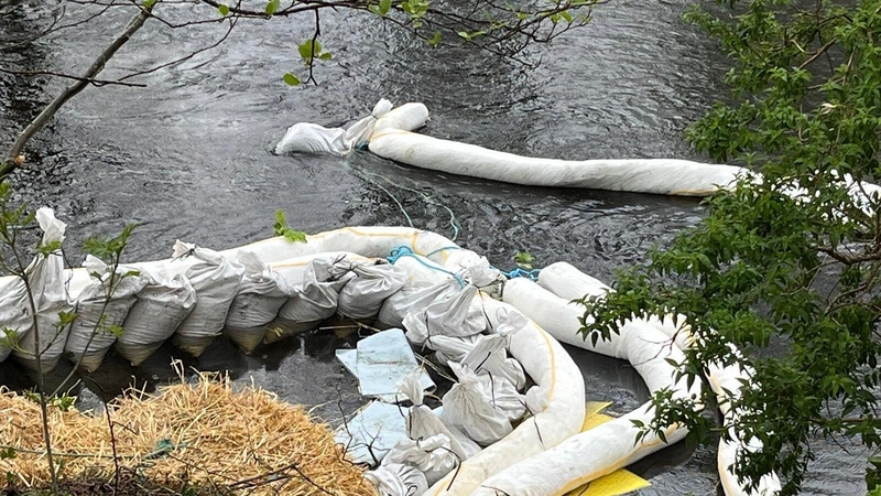 A protective boom has been placed around the area to help contain the spill