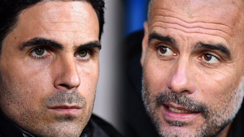 Mikel Arteta (L) squares up to Pep Guardiola