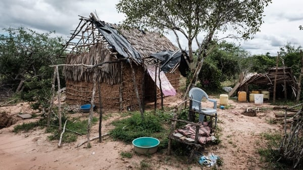 An abandoned house in the forest that buried bodies have been exhumed