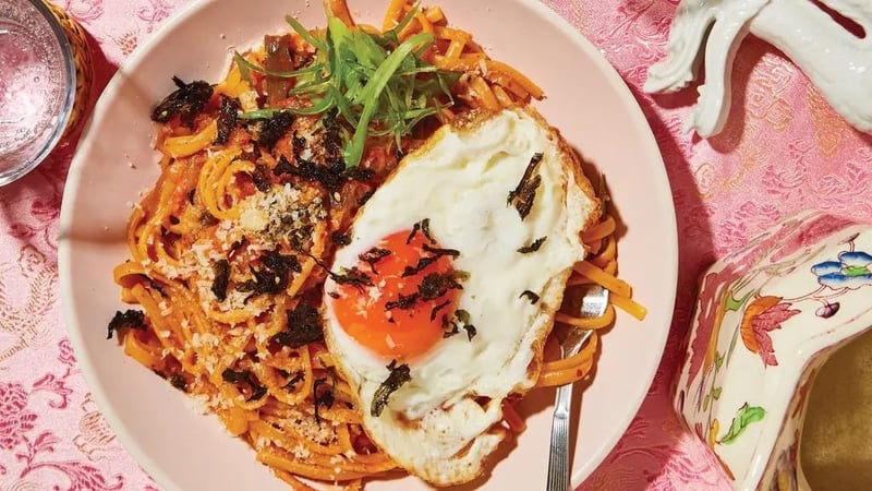 Bring the funk with this pasta dish, topped off with a fried egg and plenty of cheese.