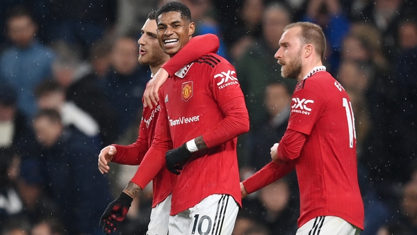 Rashford celebrates with Dalot and Eriksen