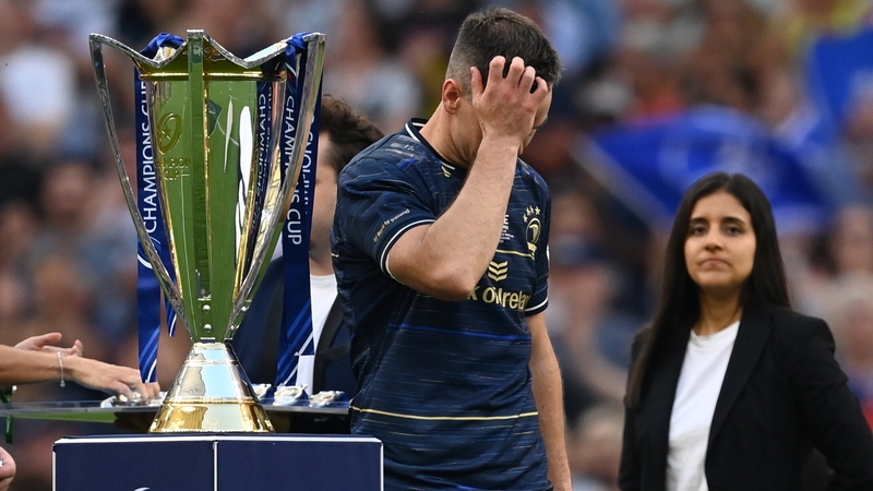 Johnny Sexton walks past the prize after last season's loss to La Rochelle