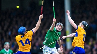 Declan Hannon of Limerick in action against Shane O'Donnell and Tony Kelly