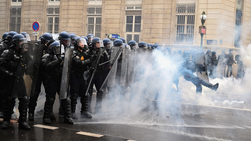 French gendarmes face off with protesters in Paris