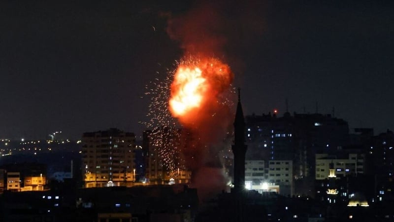 Smoke rises above buildings in Gaza City