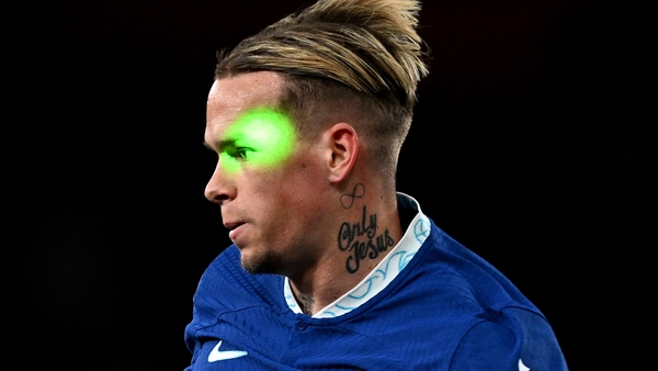 The beam of a Green Laser is seen hitting the eyes and face of Mykhaylo Mudryk