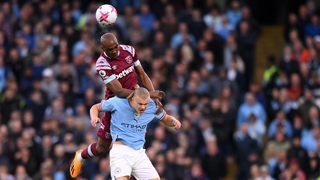 Angelo Ogbonna rises above Erling Haaland