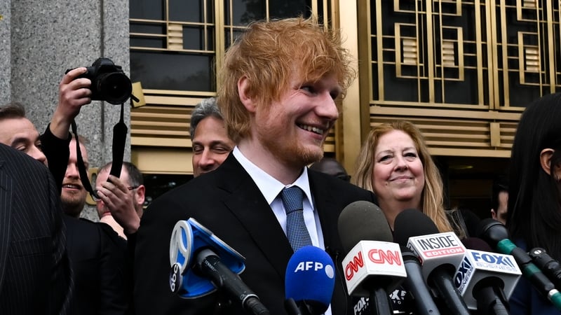Sheeran talks to the press outside the courthouse in New York. Picture: Getty