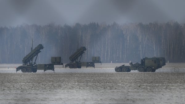 Polish-operated US Patriot surface-to-air missile systems scan the skies in Warsaw