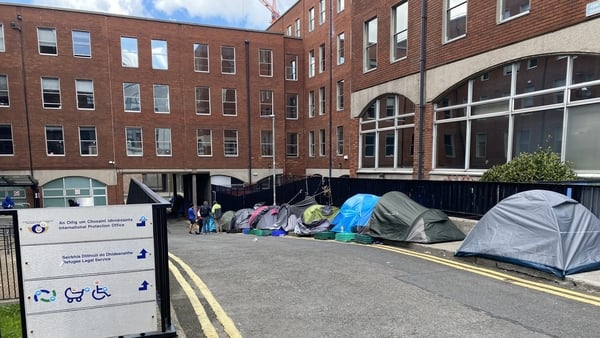 Asylum seekers in tents at the International Protection Office in Dublin last month