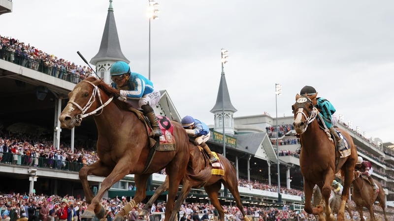Mage, ridden by jockey Javier Castellano crosses the finish line to win the 149th running of the race