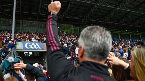 Pádraic Joyce salutes his son Charlie as he lifts the Nestor Cup