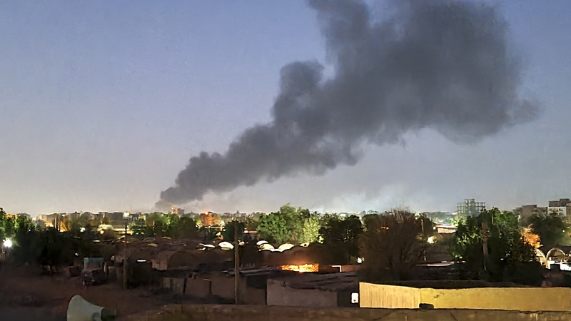 Smoke billows in Khartoum amid ongoing fighting between the forces of two rival generals in Sudan