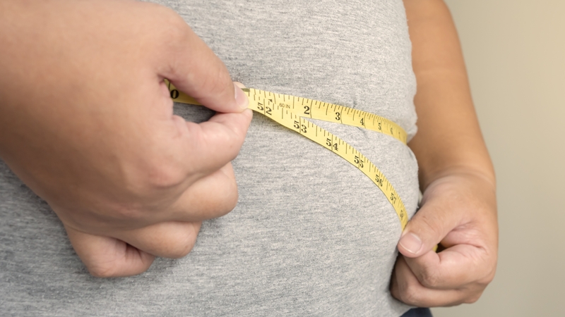 Obesity is so prevalent it has become more common than being underweight in most nations (stock pic)