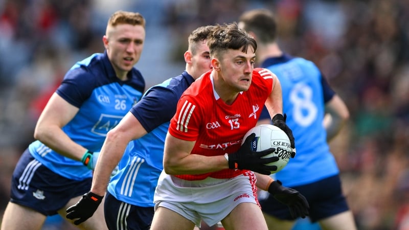 Dáire McConnon of Louth in action against Dublin