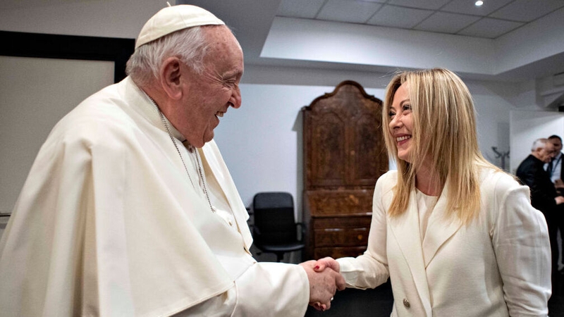 Pope Francis greets Italian Prime Minister Giorgia Meloni who also addressed the meeting in Rome