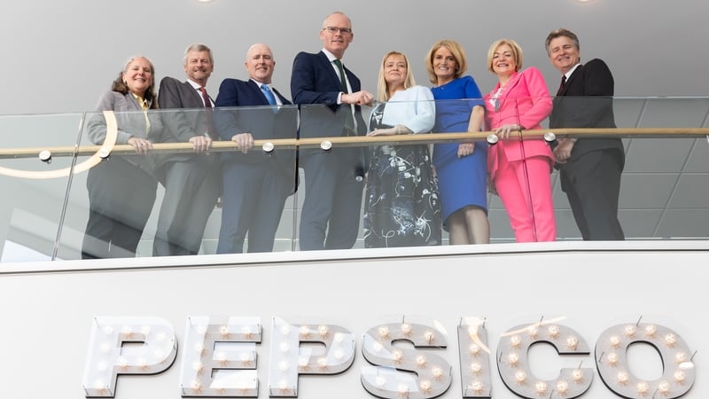 Minister Simon Coveney along with PepsiCo and IDA Ireland executives at PepsiCo's Little Island plant in Cork