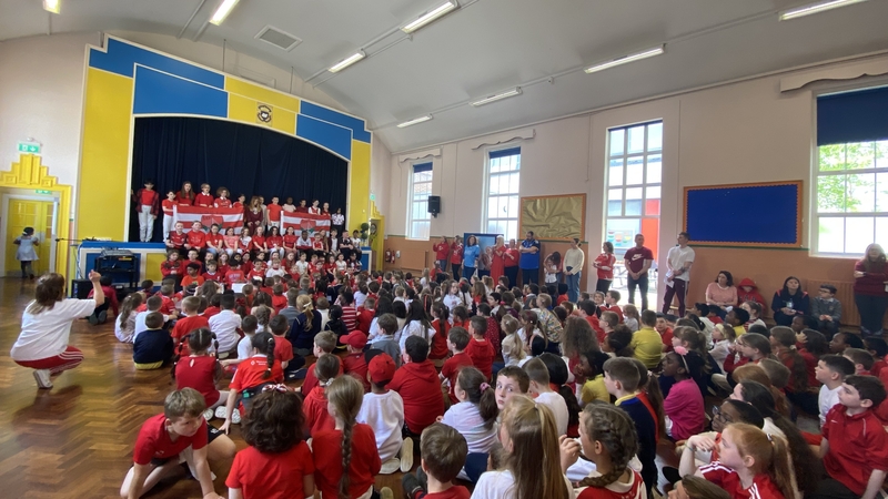 Children at CBS Primary School in Dundalk don their red and white jerseys ahead of this weekend's Leinster Final
