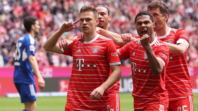 Joshua Kimmich celebrates with teammates Leroy Sane, Thomas Müller and Serge Gnabry after he found the net against Schalke
