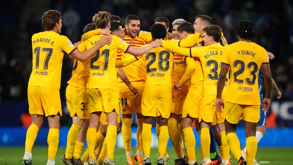 Barca players celebrate after clinching the title