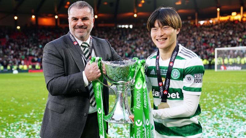Celtic manager Angelos Postecoglou (L) and Kyogo Furuhashi
