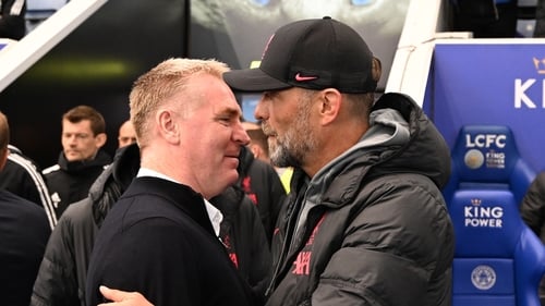 Dean Smith (L) and Jurgen Klopp