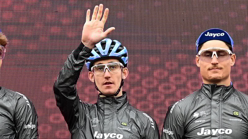Eddie Dunbar (l) waves to the crowd during Tuesday's event