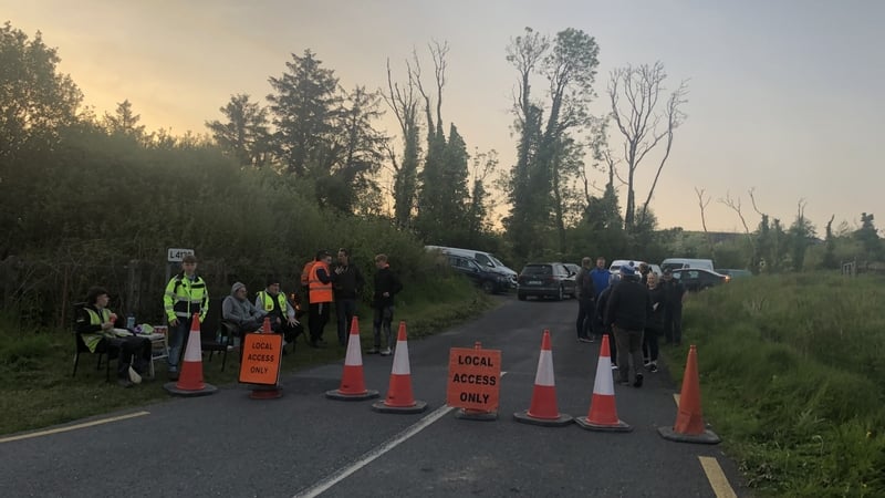 Protesters block access to a hotel that is being used to house asylum seekers in Inch, Co Clare