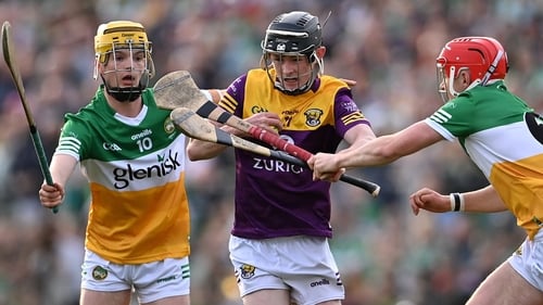 Bourke Ultimatum: Corey Byrne Dunbar of Wexford in action against Dan (L) and Sam Bourke