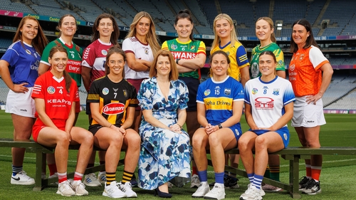 Camogie Association president Hilda Breslin (centre, front row) with players from 12 counties at today's championship launch