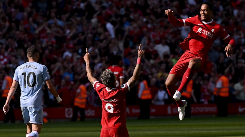 Roberto Firmino celebrates his equalising goal at Anfield