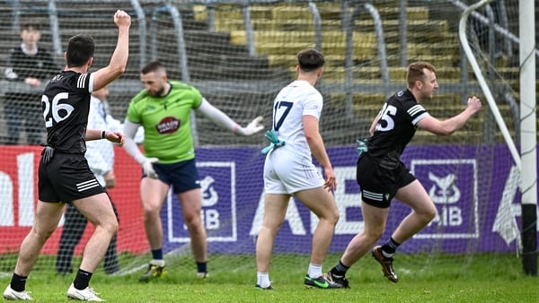 Mikey Gordon (left) and Niall Murphy celebrate David Quinn's late leveller