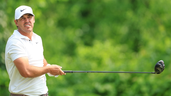 Koepka leads, but not as convincingly