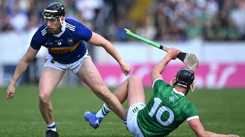 Dan McCormack of Tipperary and Limerick's Gearóid Hegarty tussle