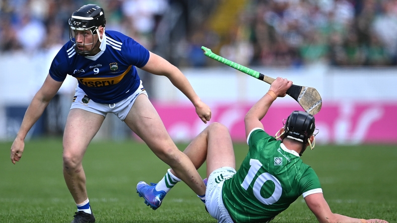 Dan McCormack of Tipperary and Limerick's Gearóid Hegarty tussle