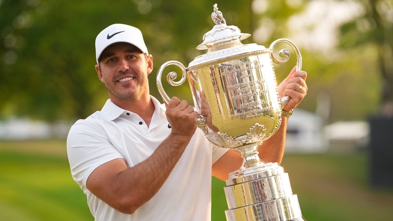 Brooks Koepka with the Wanamaker trophy