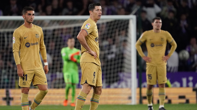 Robert Lewandowski scored a late consolation for Xavi's side