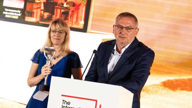 Bulgarian writer Georgi Gospodinov and translator Angela Rodel speaking after receiving their award