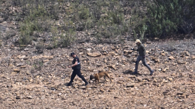 Dozens of officers focused their search on the reservoir's shoreline and a hill above