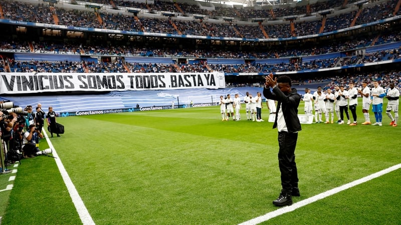 Real Madrid fans and players show their support for Vinicius Junior
