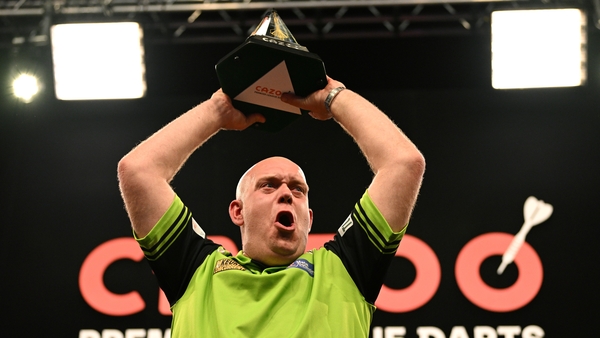 Michael van Gerwen celebrates with the title