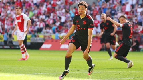 Jamal Musiala Bayern Munich celebrates the goal that won the title