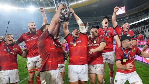 Munster players celebrate last season's URC triumph