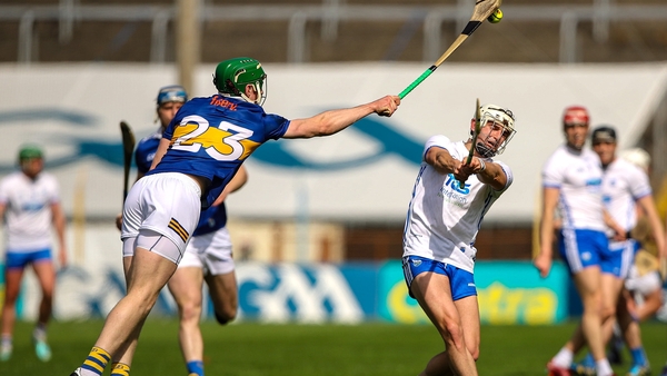 Waterford's Dessie Hutchinson has his shot blocked by Brian McGrath