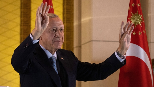 Turkish president Tayyip Erdogan acknowledges supporters at the presidential palace after winning reelection. Photo: Getty Images