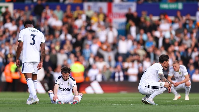 Dejected Leeds players after relegation was confirmed at Elland Road on Sunday