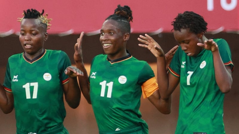 Barbra Banda (centre) celebrates one of her goals against China at the Tokyo Games