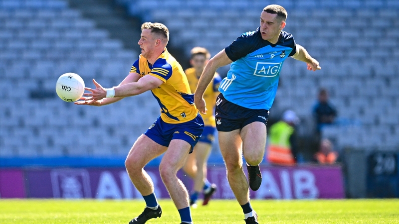 Roscommon's Eoin McCormack gets a pass away against Dublin. In one play, Roscommon stitched together 77 passes over five and a half minutes of play before Ciarán Murtagh fired over a point